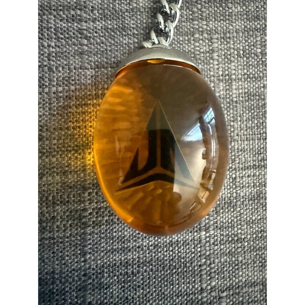 Jurassic park JA 3 Nike Keychain Amber Keychain Pendant
